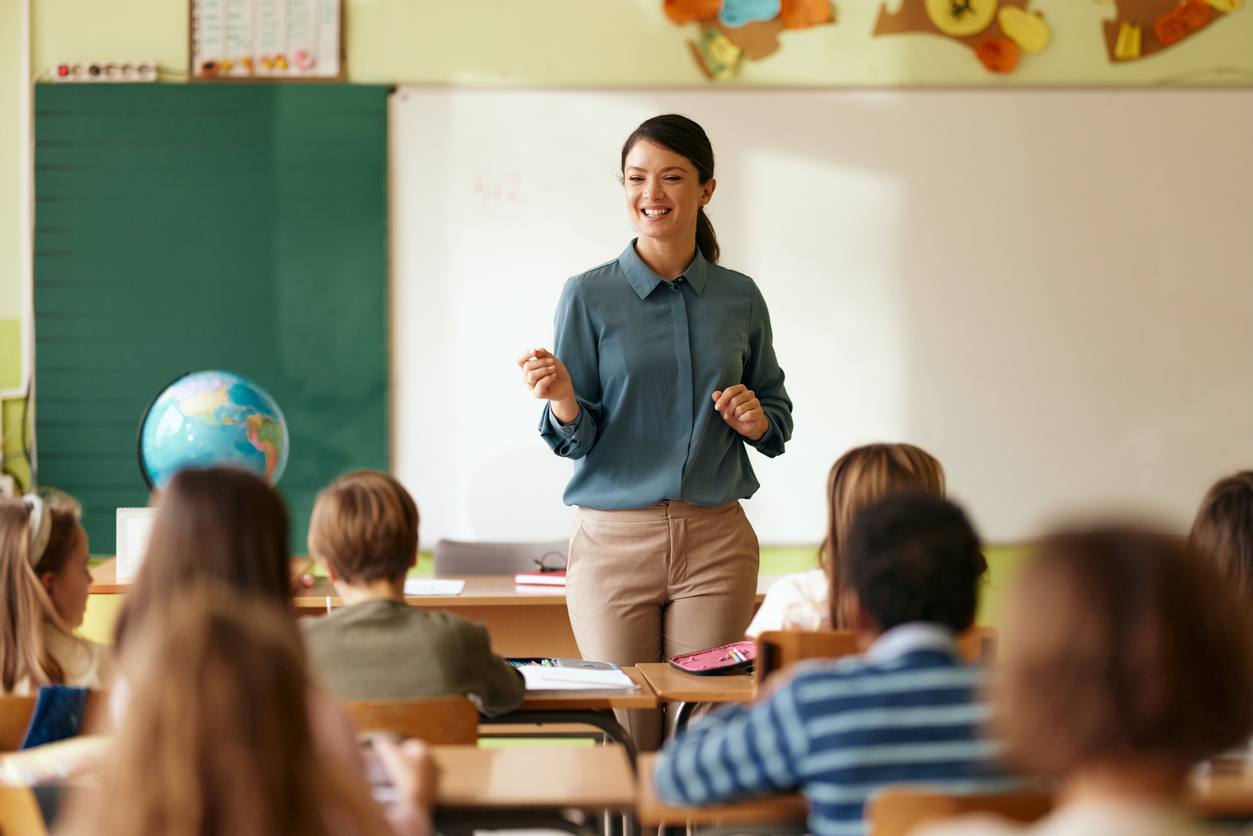 A Substitute Teacher Stands in Front of a Classroom of Students..jpg
