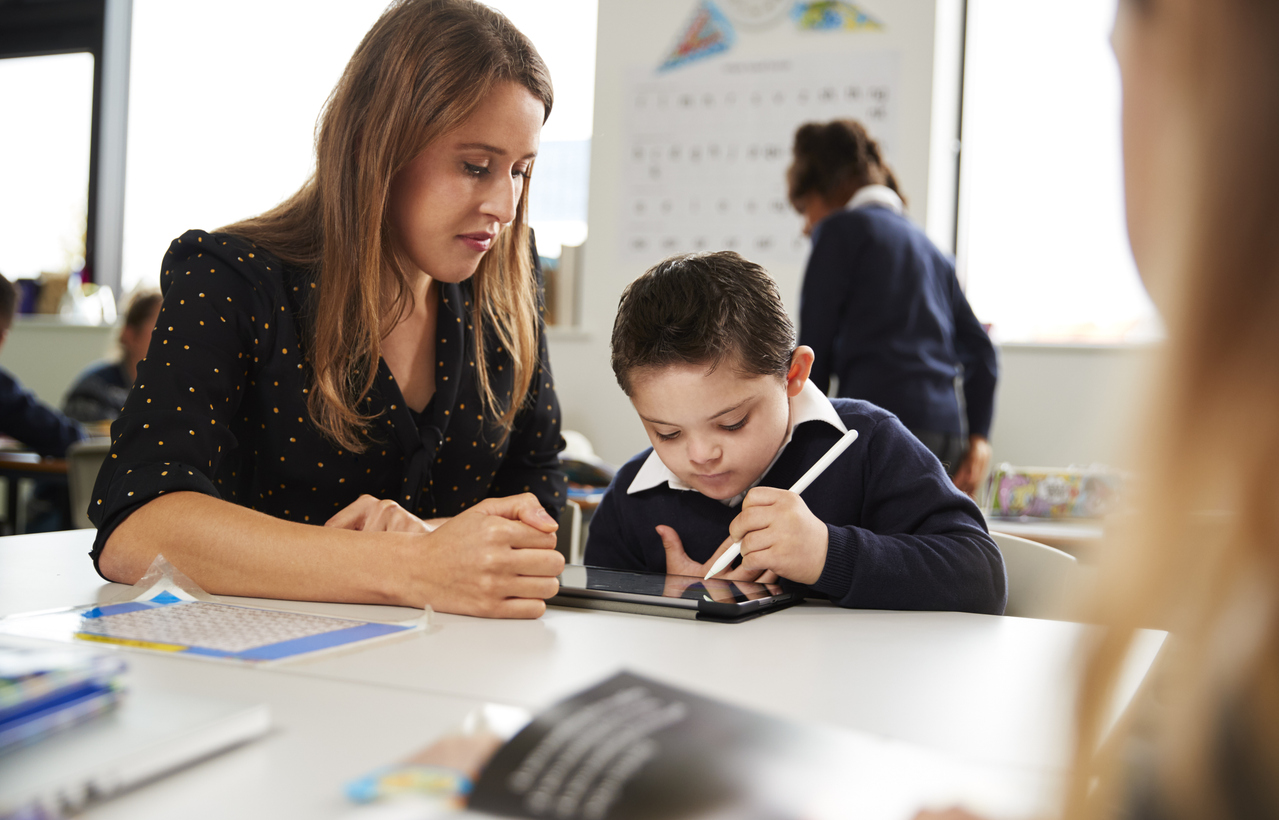 An Educational Diagnostician Observes a Student Using a Tablet